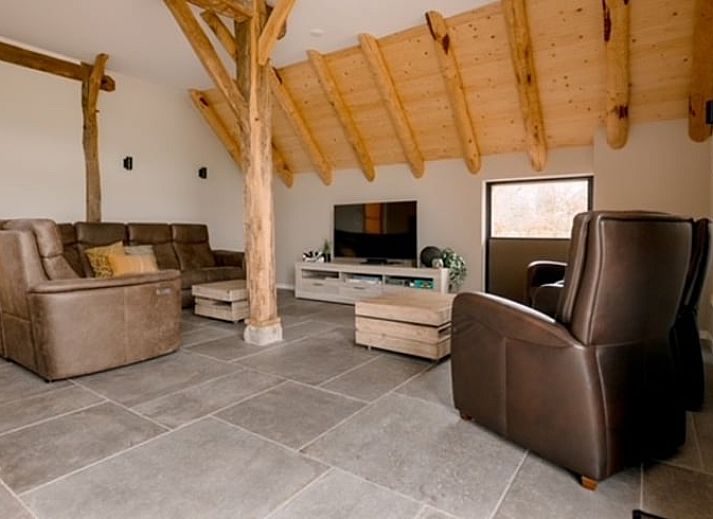 Entrance of Cottage in Agelo in Twente, Overijssel, overlooking the nature and modern interior of the cottage.