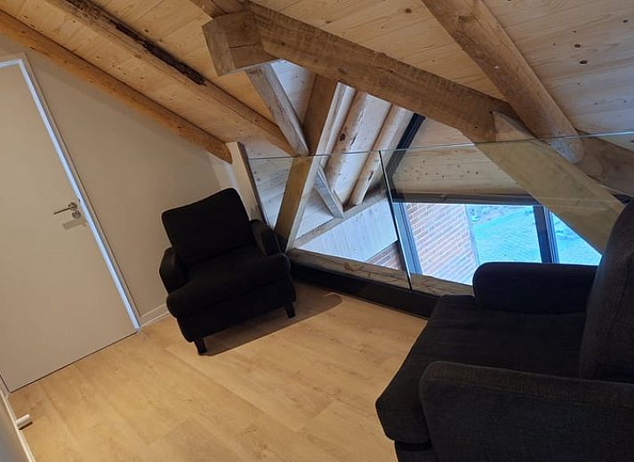 Entrance of Cottage in Agelo in Twente, Overijssel, overlooking the nature and modern interior of the cottage.