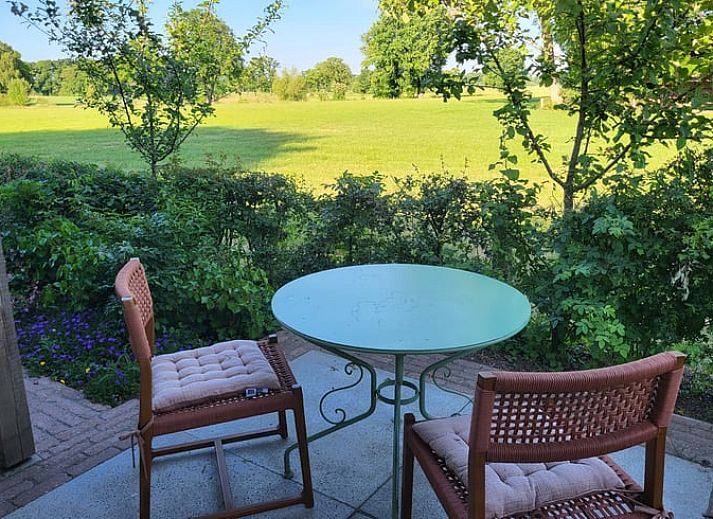 Luxe slaapkamer in Vakantiehuisje in Bornerbroek, Twente, Overijssel met groot tweepersoonsbed.