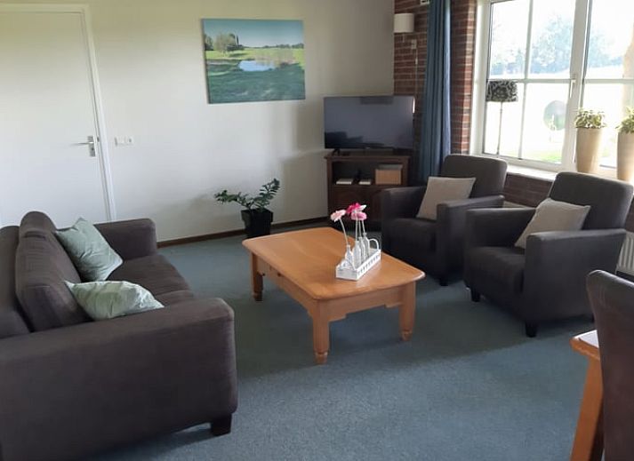 Cozy terrace at Holiday home in Lattrop Breklenkamp, ideal for outdoor dining in Twente, Overijssel.