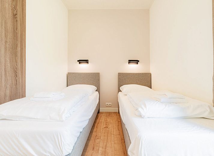 Lichte woonkamer van Vakantievilla Amalia 6 in Lattrop-Breklenkamp, Twente, Overijssel.