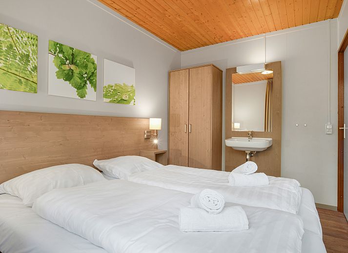 Geraeumiges Wohnzimmer im Twenhaarsveld 18-Personen-Wiedervereinigungsbungalow in Holten, Overijssel.