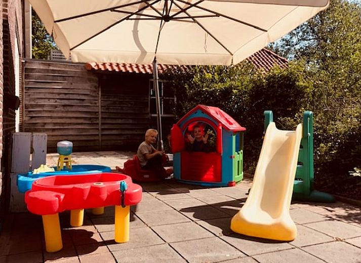 Cottage in Holten, a charming vacation home in the green surroundings of Holten, Salland, Overijssel, with rustic atmosphere and serene nature.