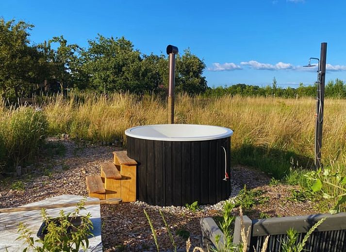 Cozy sitting area on terrace of cottage in Wijhe, Salland, Overijssel.