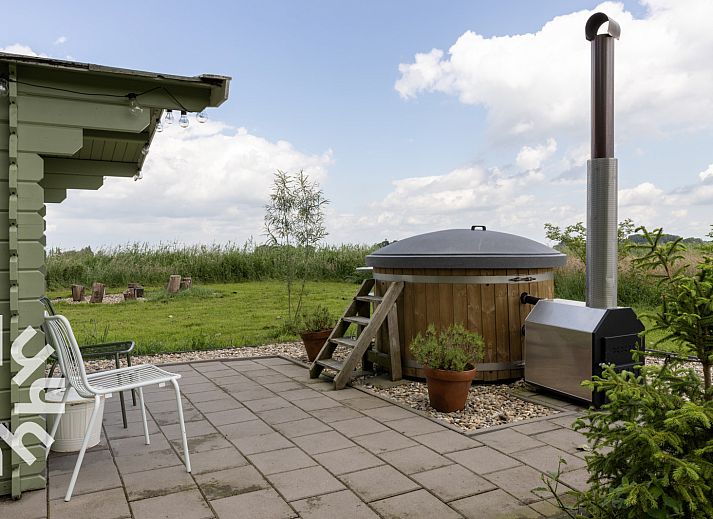 Attractive bedroom in OV530 vacation home, Zwolle, Overijssel with skylight and two beds.