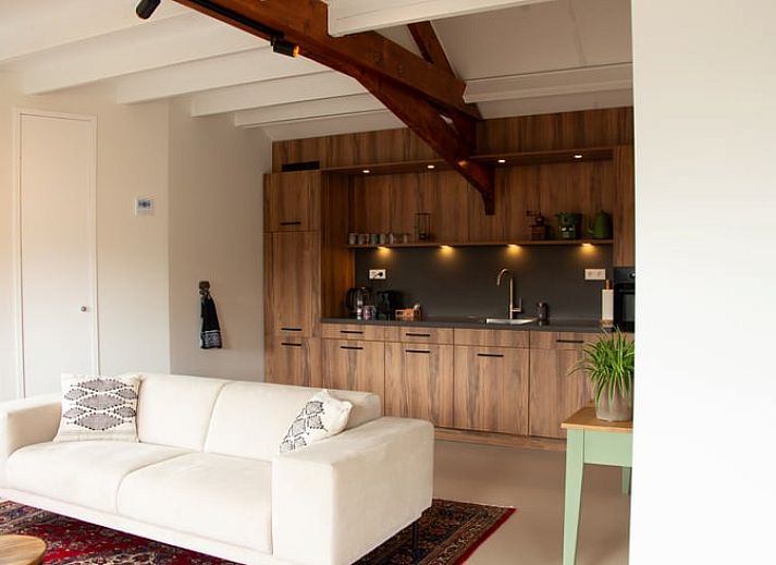 Vakantiehuisje in Deventer met zonnepanelen, gelegen in Salland, Overijssel, biedt een duurzame en rustieke accommodatie.