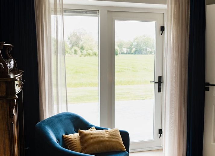 Ontspan in de jacuzzi met uitzicht bij Huisje in Heeten, een vakantiehuis in Salland, Overijssel.
