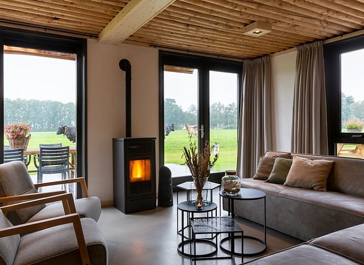 Cozy living room in Holiday home in Heeten overlooking meadows, located in Salland, Overijssel.