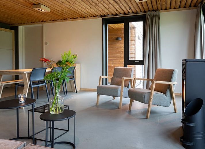 Modern open kitchen and dining area in Holiday cottage in Heeten, perfect for a vacation in Salland, Overijssel.