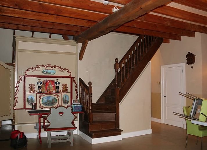 Side view of cottage in Heeten, Overijssel, with traditional thatched roof.