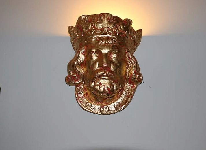 Cozy covered terrace at cottage in Heeten, ideal for outdoor dining.