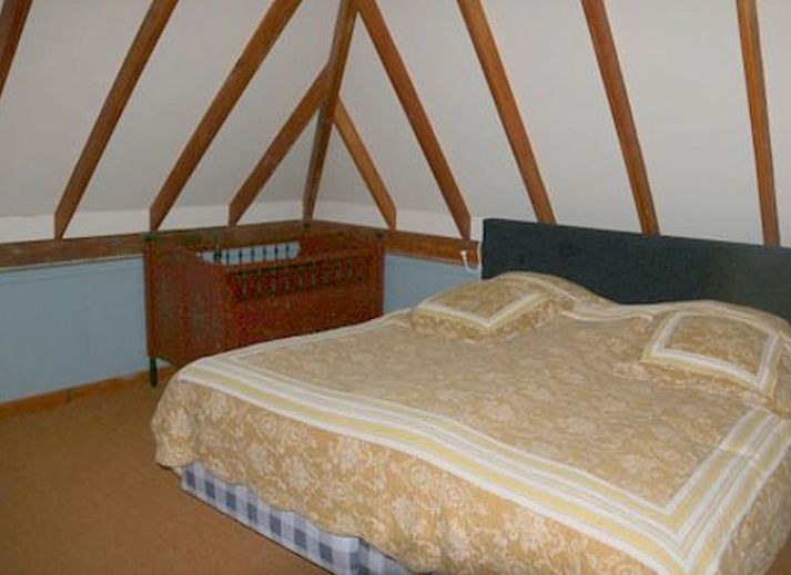 Cozy covered terrace at cottage in Heeten, ideal for outdoor dining.