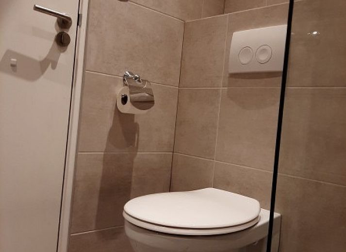 Gemuetliches Schlafzimmer im Gasthof de Tukkel, Heeten, mit viel natuerlichem Licht und einem gemuetlichen Ambiente in Overijssel.