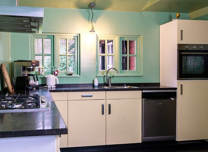 Summer table atmosphere at Holiday home in Okkenbroek, Salland, overlooking the green garden in beautiful Overijssel.