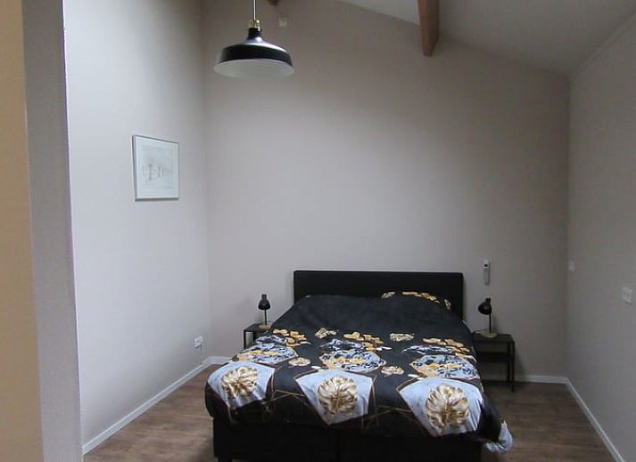 Ferienhaus in Olst mit Blick auf einen Teich und die Natur, gelegen in Salland, Overijssel.