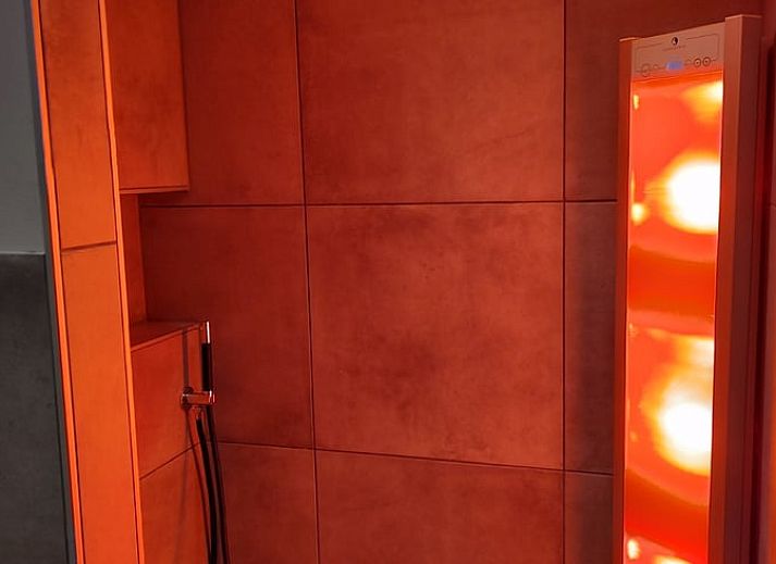 Cozy dining room in Holiday home in Nieuwleusen, Salland, with wooden table in Overijssel.