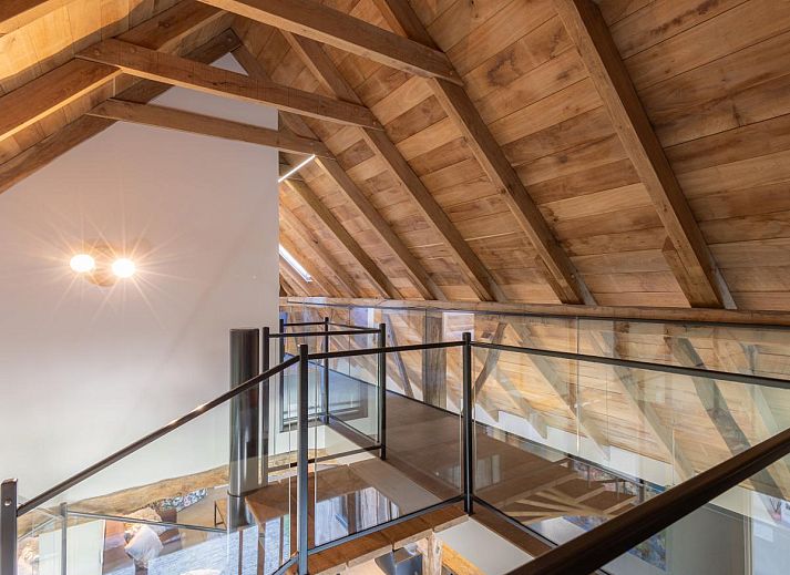 Cozy bedroom with wooden details in Guesthouse Prinsensteeg, vacation home in Nieuwleusen, Overijssel.