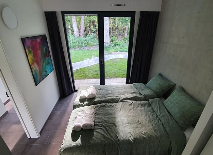 Cottage in Hellendoorn, a charming vacation home in the green surroundings of Salland, Overijssel, surrounded by natural splendor.