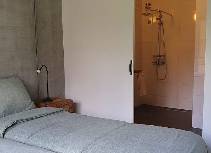 Vakantiehuis in Hellendoorn met moderne veranda, gelegen in de groene natuur van Salland, Overijssel.