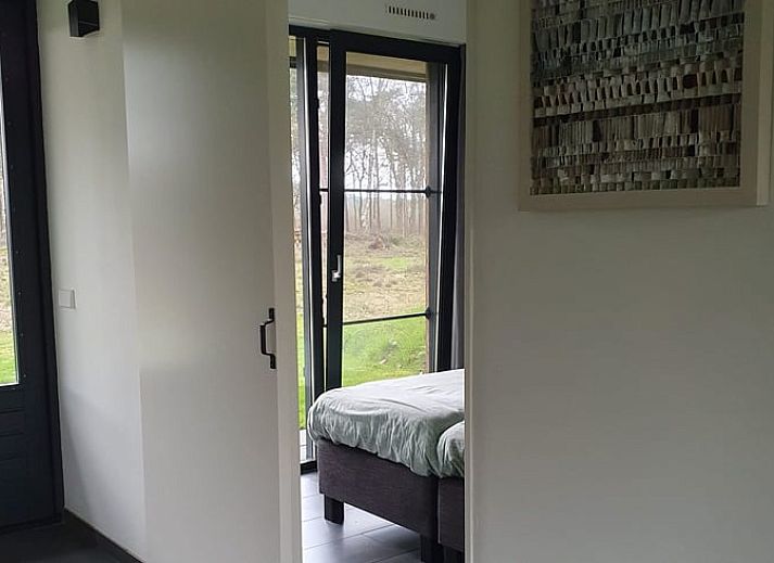 Vakantiehuis in Hellendoorn met moderne veranda, gelegen in de groene natuur van Salland, Overijssel.