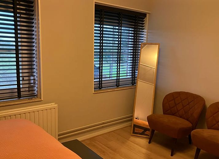 Rustikales Ferienhaus in Hellendoorn, gelegen im gruenen Salland, Overijssel, mit einem charmanten Garten und laendlicher Umgebung.