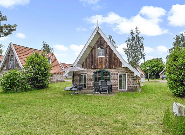 Gemuetliches Wohnzimmer in Landgoed De Hellendoornse Berg, 4-Personen-Bungalow Notar, Haarle, Overijssel.