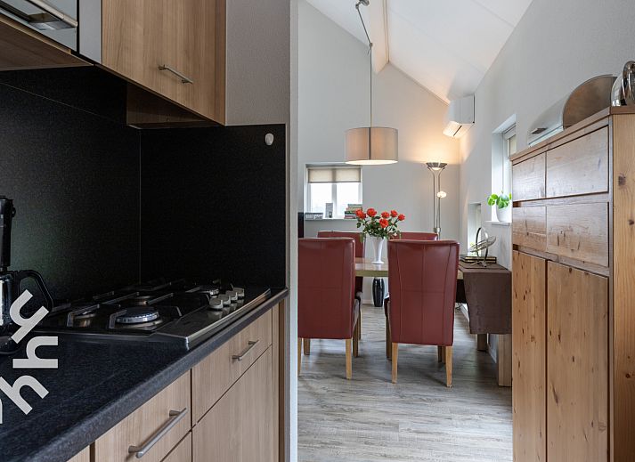 Terras bij vakantiehuis OV218 in Haarle, Hellendoorn, met uitzicht op groene weiden in Salland, Overijssel.