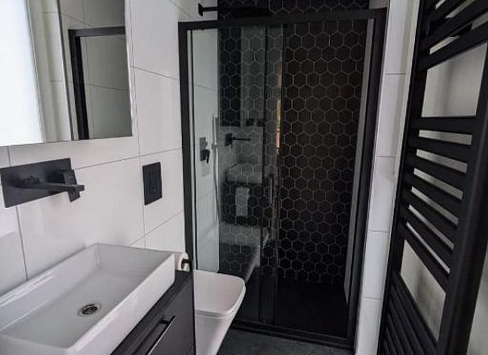 Gezellige binnenruimte van Vakantiehuisje in Haarle met sfeervolle decoratie, perfect voor een vakantie in Hellendoorn, Overijssel.