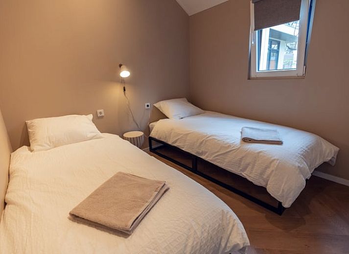 Geniet van sfeervolle verlichting bij de jacuzzi van Vakantiehuisje in Haarle, Hellendoorn.