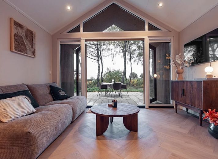 Vakantiehuisje in Haarle biedt een gezellige buitenruimte met jacuzzi en terras in Overijssel.