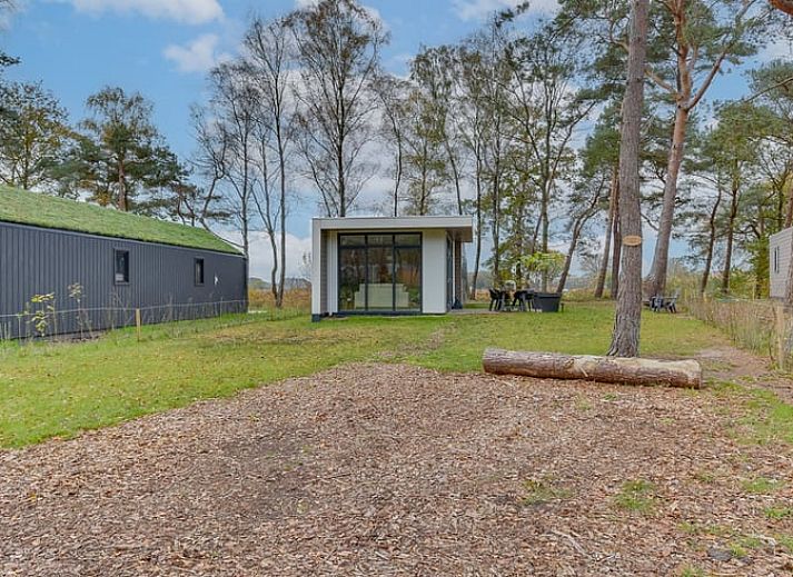 Stilvolles Wohnzimmer im Ferienhaus in Haarle, mit Blick auf die gruene Landschaft von Salland, Overijssel.