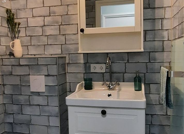 Cozy living room of Holiday Home in Wesepe, Salland with wood stove and wooden interior.