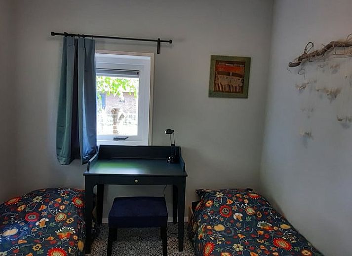 Cozy living room of Holiday Home in Wesepe, Salland with wood stove and wooden interior.