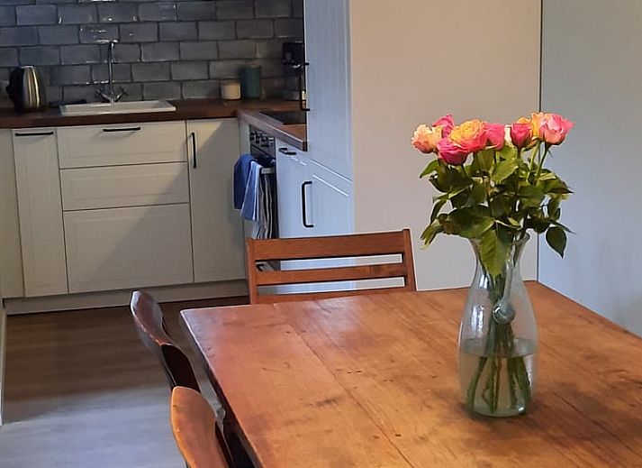 Cozy living room of Holiday Home in Wesepe, Salland with wood stove and wooden interior.
