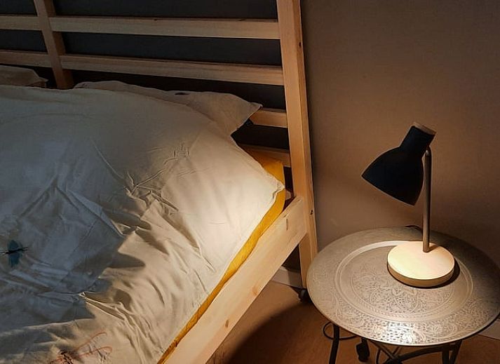 Cozy living room of Holiday Home in Wesepe, Salland with wood stove and wooden interior.