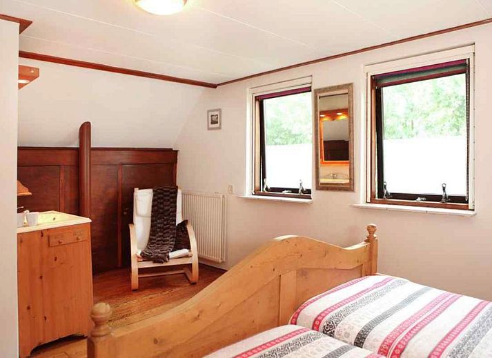 Front of vacation home OV114 in Kamperveen, with green garden in Salland, Overijssel