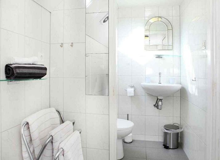 Cozy interior of vacation home OV114 in Kamperveen, Overijssel, with vintage furniture