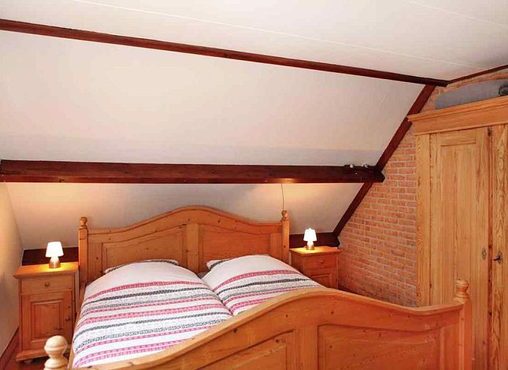 Cozy interior of vacation home OV114 in Kamperveen, Overijssel, with vintage furniture