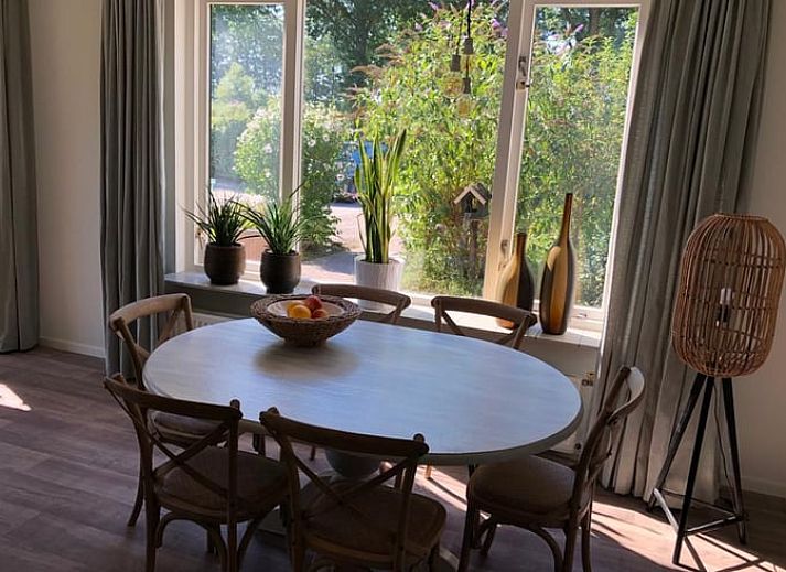 View of the vacation home Cottage in Lettele, surrounded by greenery in Salland.