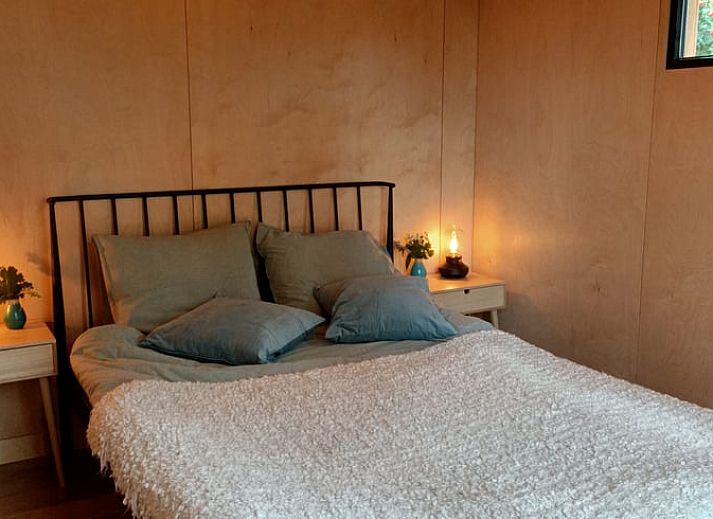 Gemuetliches Wohnzimmer im Ferienhaus in Lettele, Salland, Overijssel mit bequemen Sitzgelegenheiten.