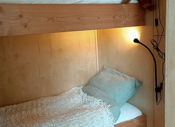 Gemuetliches Wohnzimmer im Ferienhaus in Lettele, Salland, Overijssel mit bequemen Sitzgelegenheiten.