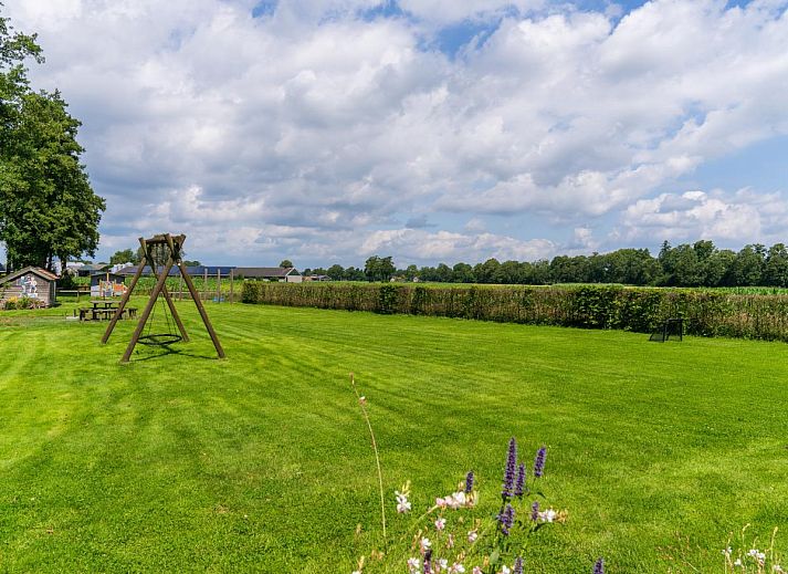 Gemuetliche Sitzecke in Regge und Weidezicht Ferienhaus in Marle, Salland, Overijssel mit Gartenblick.