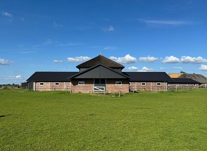 Vakantiehuisje in Boskamp, Salland, met prachtig uitzicht op groene velden in Overijssel.