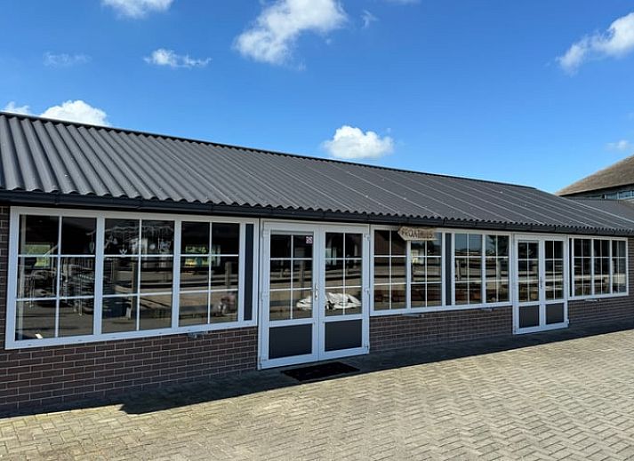 Gezellige binnenruimte van Vakantiehuisje in Boskamp, Salland, met comfortabele zithoek in Overijssel.