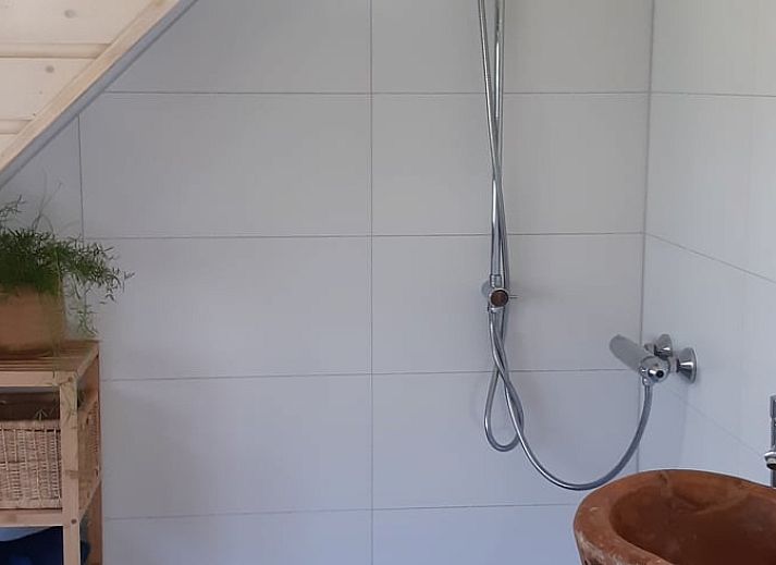 Outdoor terrace of Holiday Home in Ommen, Vechtstreek, Overijssel, with hot tub.