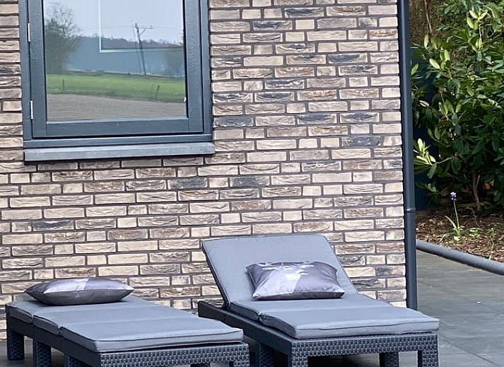 Cozy terrace at Holiday home in Ommen, surrounded by nature in the Vecht region, Overijssel, ideal for a relaxing evening outside.