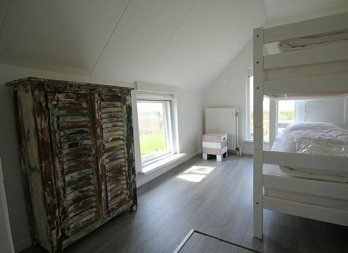 Spacious terrace at Farm de Vechtvallei, vacation home in the Vecht region, ideal for outdoor dining.