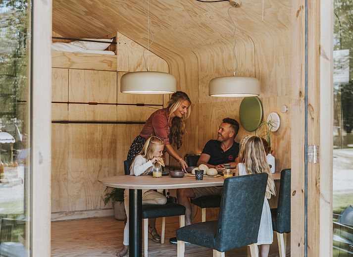 Wrap-house vacation home in Beerze with veranda and family enjoying nature in the Vecht region, Overijssel.