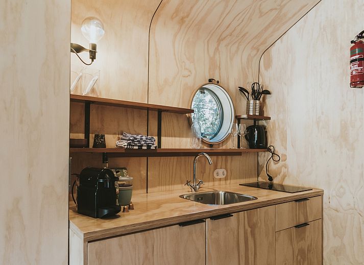 Rustic Wikkelhouse glamping lodge surrounded by green nature in Beerze, Vechtstreek, Overijssel.