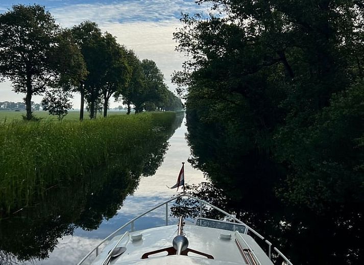 Zonsondergang bij Huisje in Daarleveen, vakantiehuis in Gramsbergen, Overijssel met prachtig uitzicht over de jachthaven.